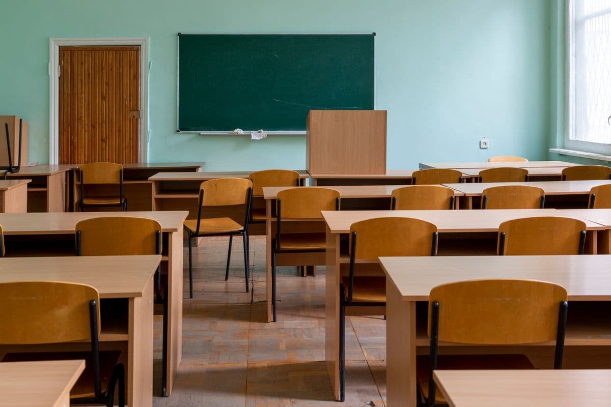 An empty classroom with desks