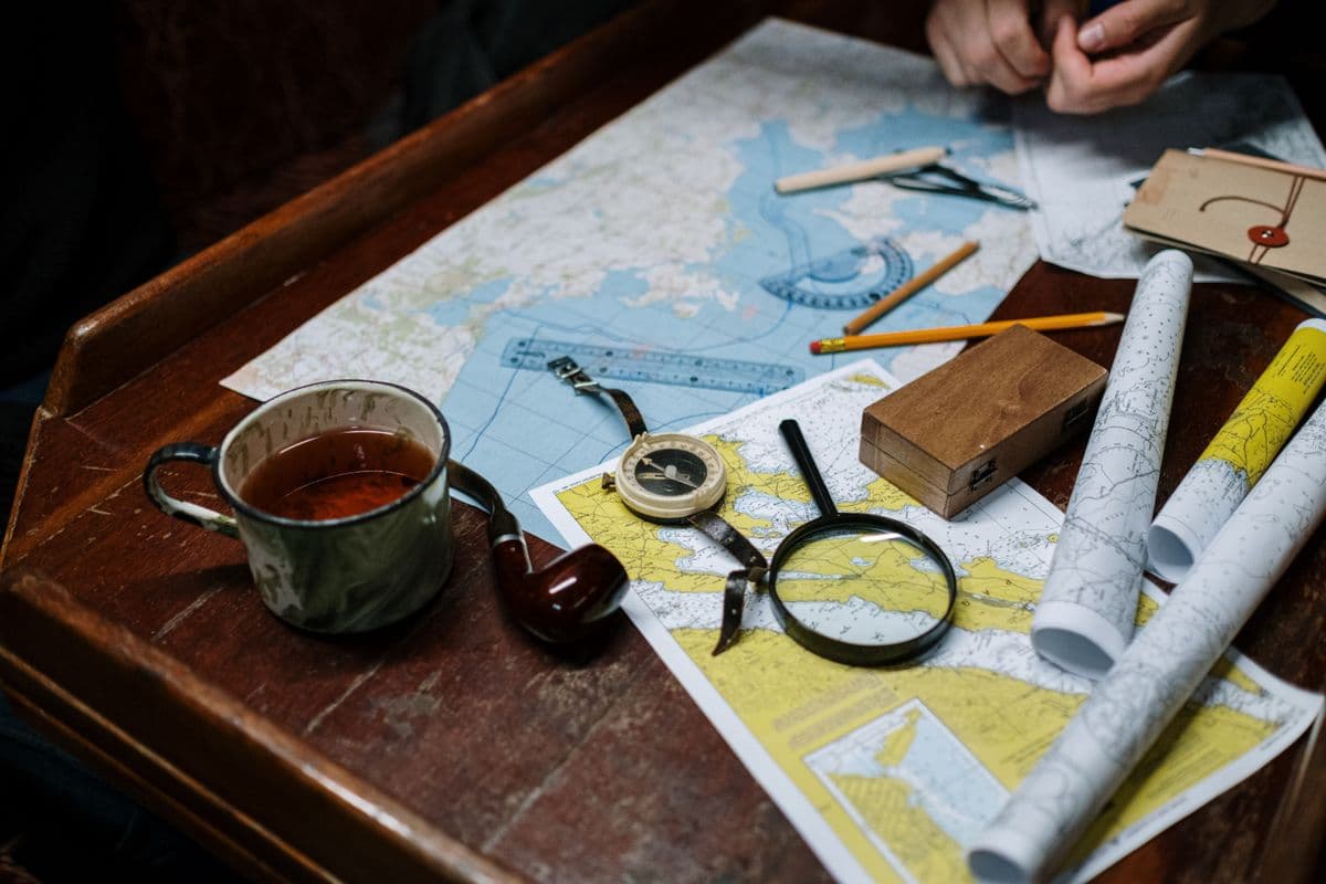 A compass resting on a map